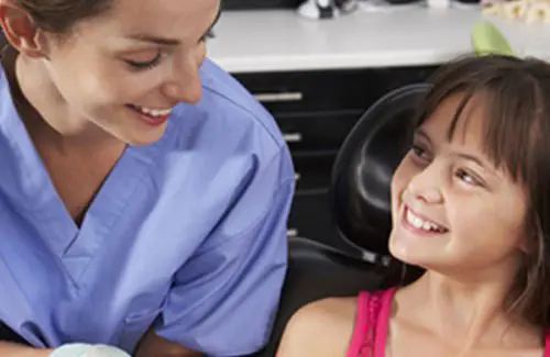 teeth cleaning on child at Little People's Dentistry; pediatric and family dentists