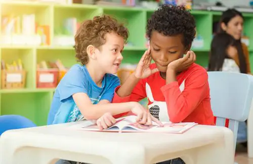 Children reading together at Interfaith Child Development Center; childcare preschool and schools