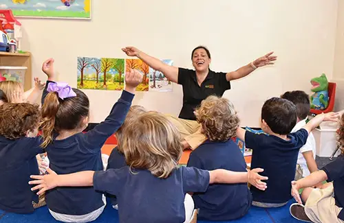 Classroom group listening to teacher at Woodlands Treehouse Preschool